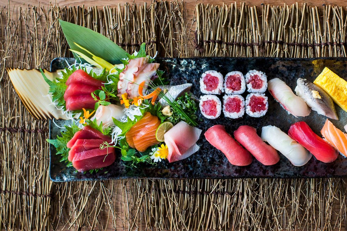 Sushi and sashimi platter with tuna, salmon and garnishes at Red Ginger Asian Bistro, an Asian Fusion Restaurant in Lake City