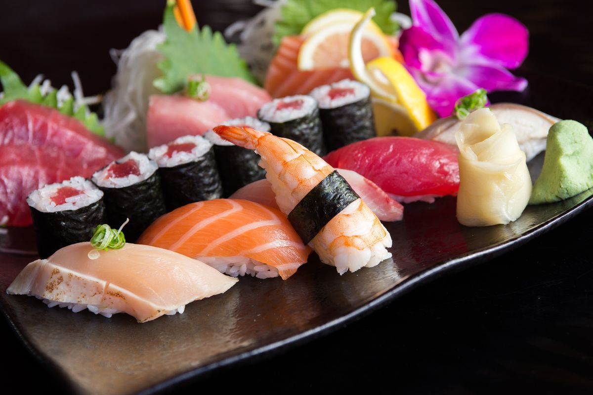Assorted sushi and sashimi platter with garnishes at Red Ginger Asian Bistro, an Asian Fusion Restaurant in Lake City