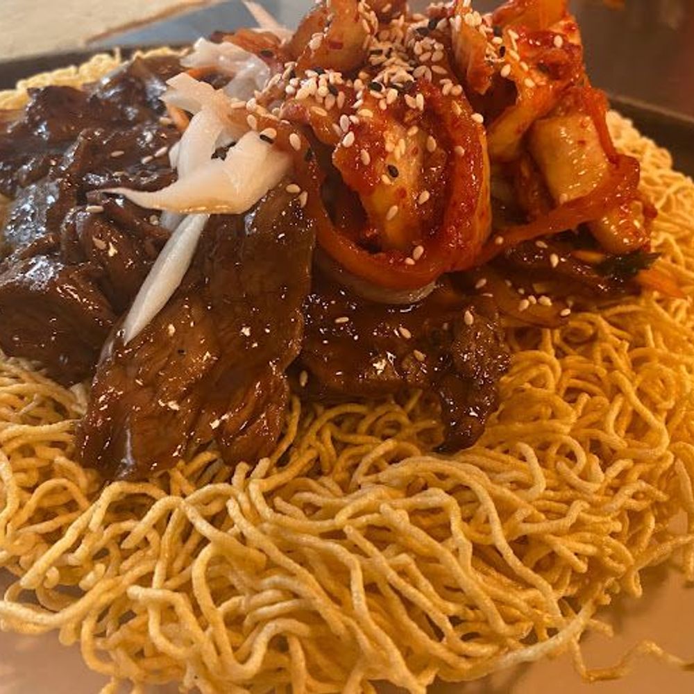 Crispy Egg Noodles with Beef and Kimchi at Rice Bistro, Asian Restaurant in Port Orange