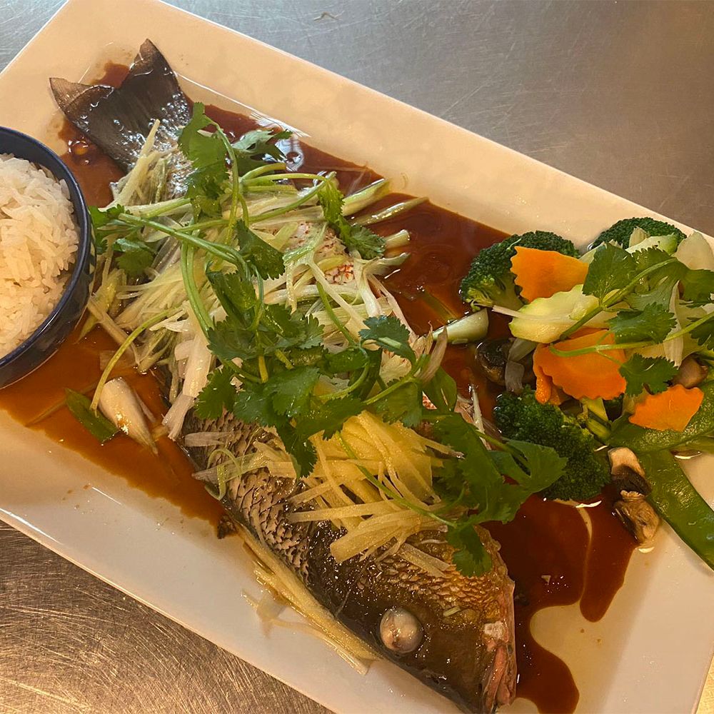 Steamed Whole Fish with Ginger and Scallions at Rice Bistro, Asian Restaurant in Port Orange
