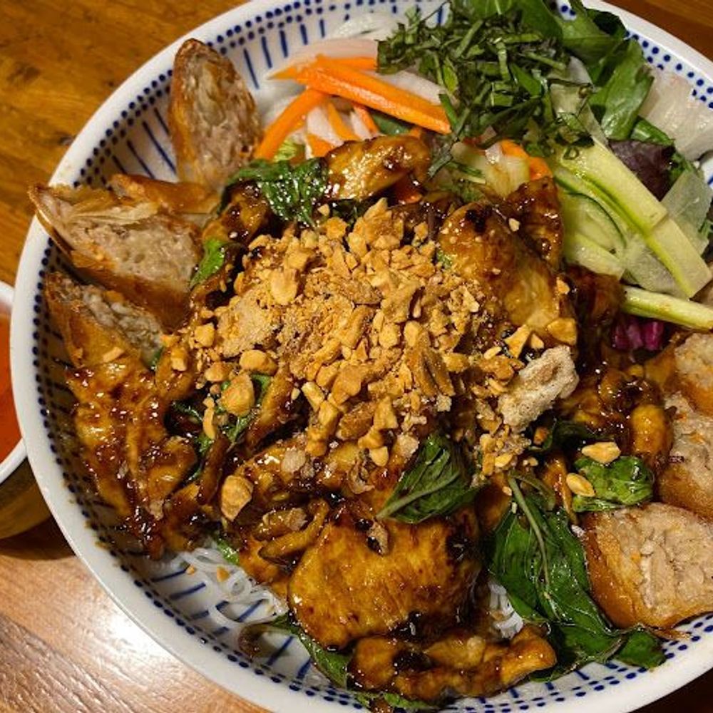 Vietnamese Vermicelli Bowl with Grilled Meat and Spring Rolls at Rice Bistro, Asian Restaurant in Port Orange