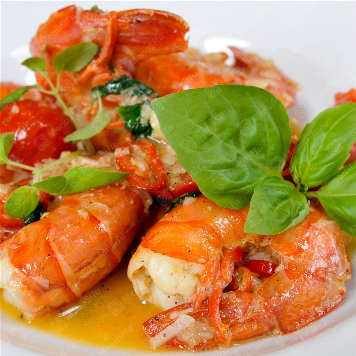 Butter garlic shrimp with fresh basil and cherry tomatoes at Rock Seafood and Fried Crabhouse, a Seafood Restaurant in Baltimore