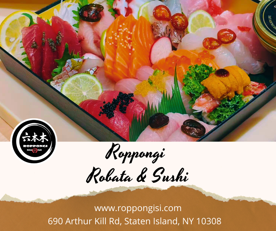 Assorted sashimi platter from Roppongi Robata & Sushi with salmon, tuna, uni and fresh garnishes.