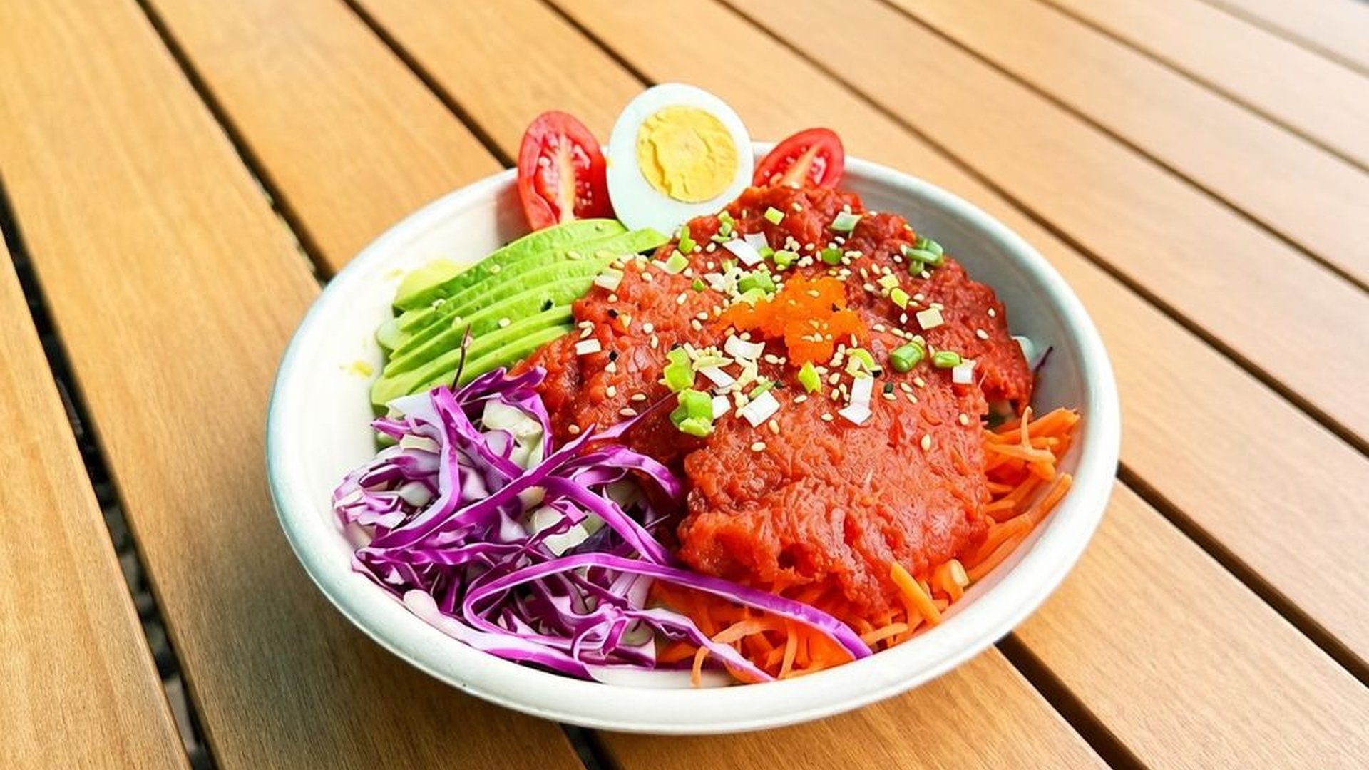Spicy minced meat poke bowl with avocado and veggies at Sakana Western, a Hawaiian Restaurant in Chicago