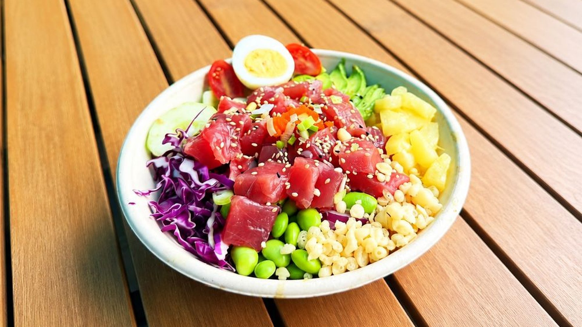 Tuna poke bowl with pineapple and mixed fresh veggies at Sakana Western, a Hawaiian Restaurant in Chicago
