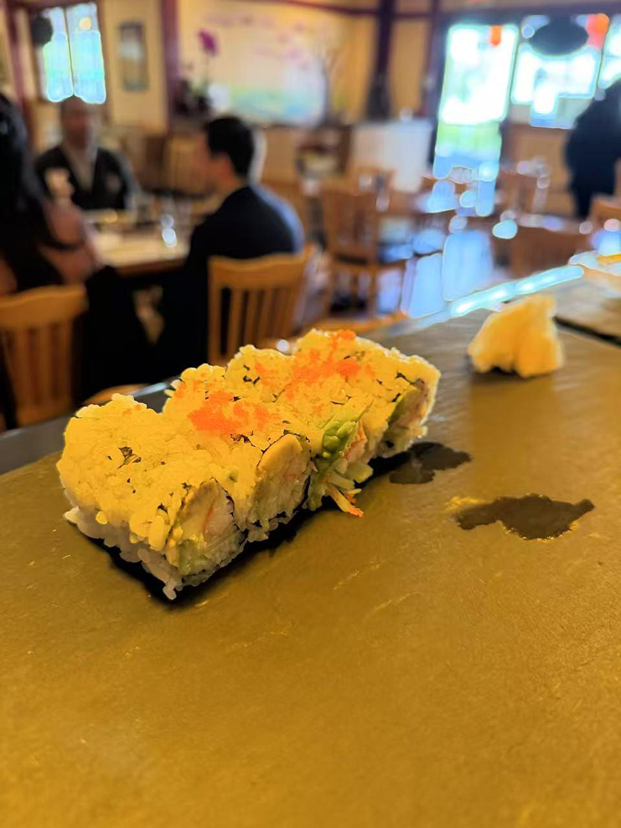 Sushi roll with avocado, crab, and orange fish roe at Sake House 2，a Japanese Restaurant in Jacksonville