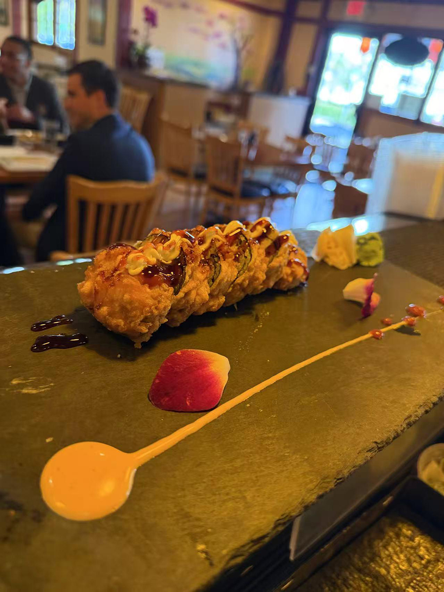 Fried sushi roll with sauces and rose petal at Sake House 2，a Japanese Restaurant in Jacksonville