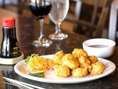 Minced shrimp, tofu, green onion, lightly fried into balls, served with Oyster dipping sauce at Sakura Home，a Japanese Restaurant in Rochester
