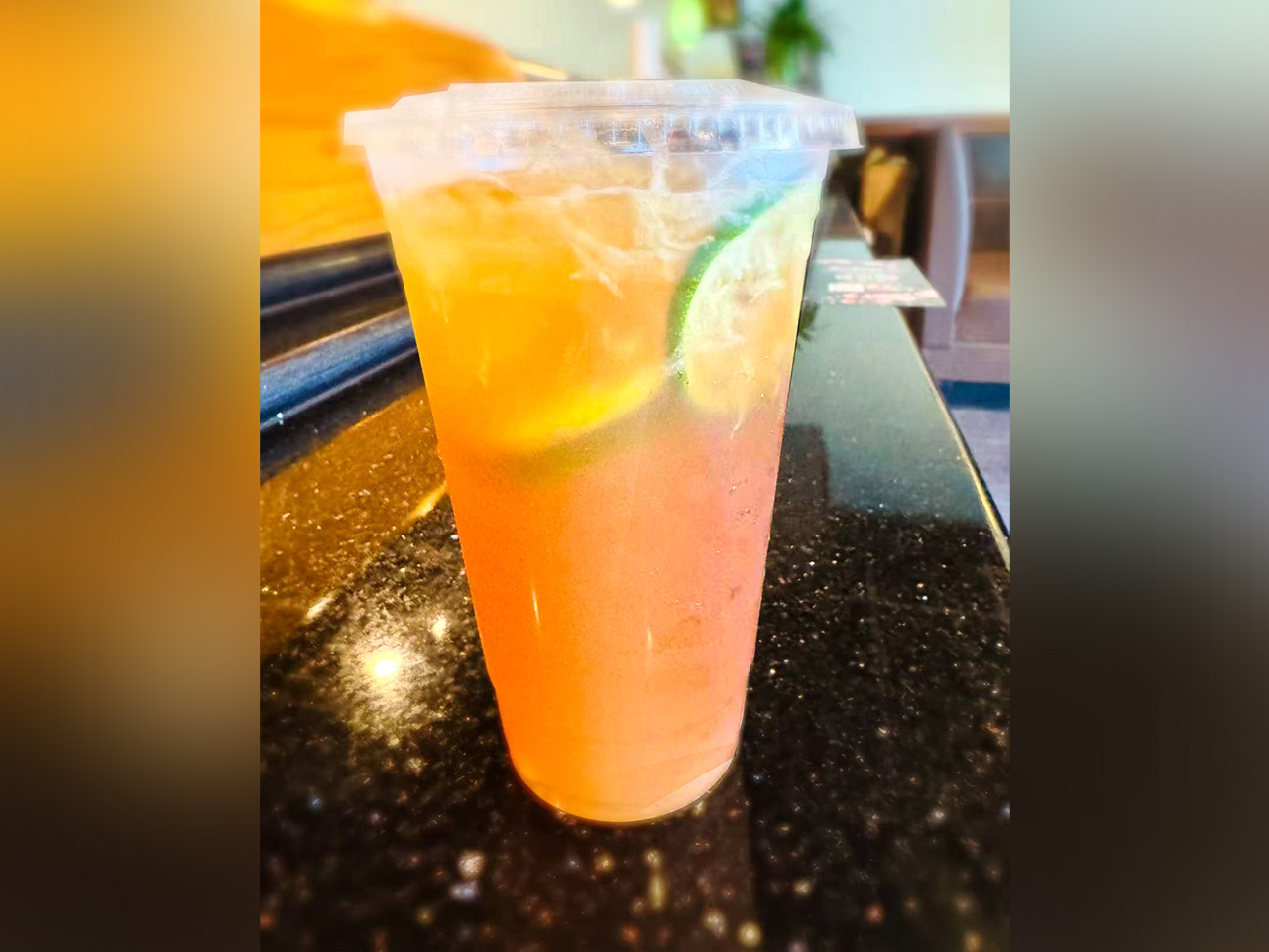 Sakura-Japanese-restaurant-Citrus-Sparkling-Drink-Clark Citrus Sparkling Drink Refreshing orange drink with lime slices and bubbles