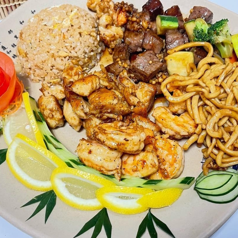 Decorated hibachi meat and seafood combo meal