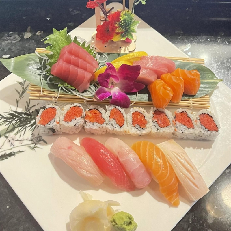 Assorted sashimi and maki sushi platter with garnishes at Sakura Sushi & Hibachi, a Japanese Restaurant in Kapolei