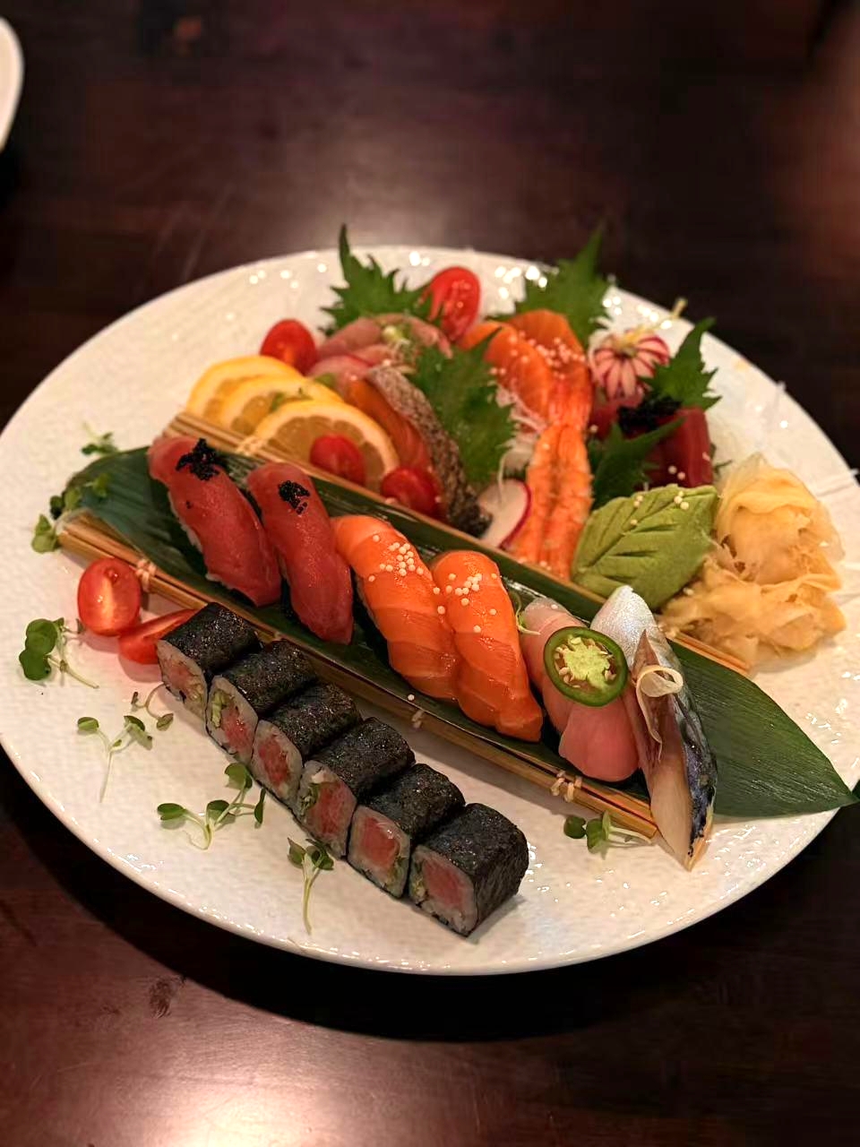 Premium sushi and sashimi platter with garnish at Sakura Sushi 88, a Japanese Restaurant in New York