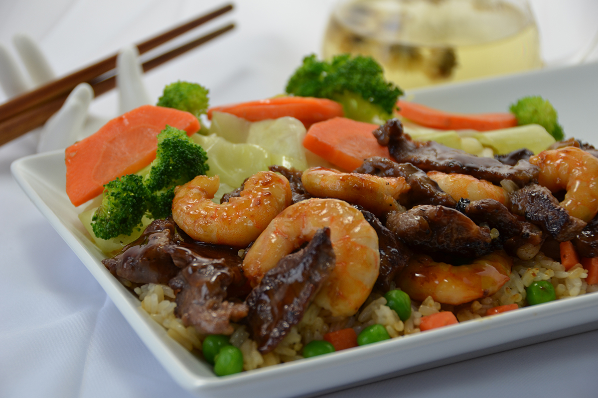 Beef and shrimp teriyaki combo over rice with veggies at Sakura Teriyaki, a Japanese Restaurant in NJ