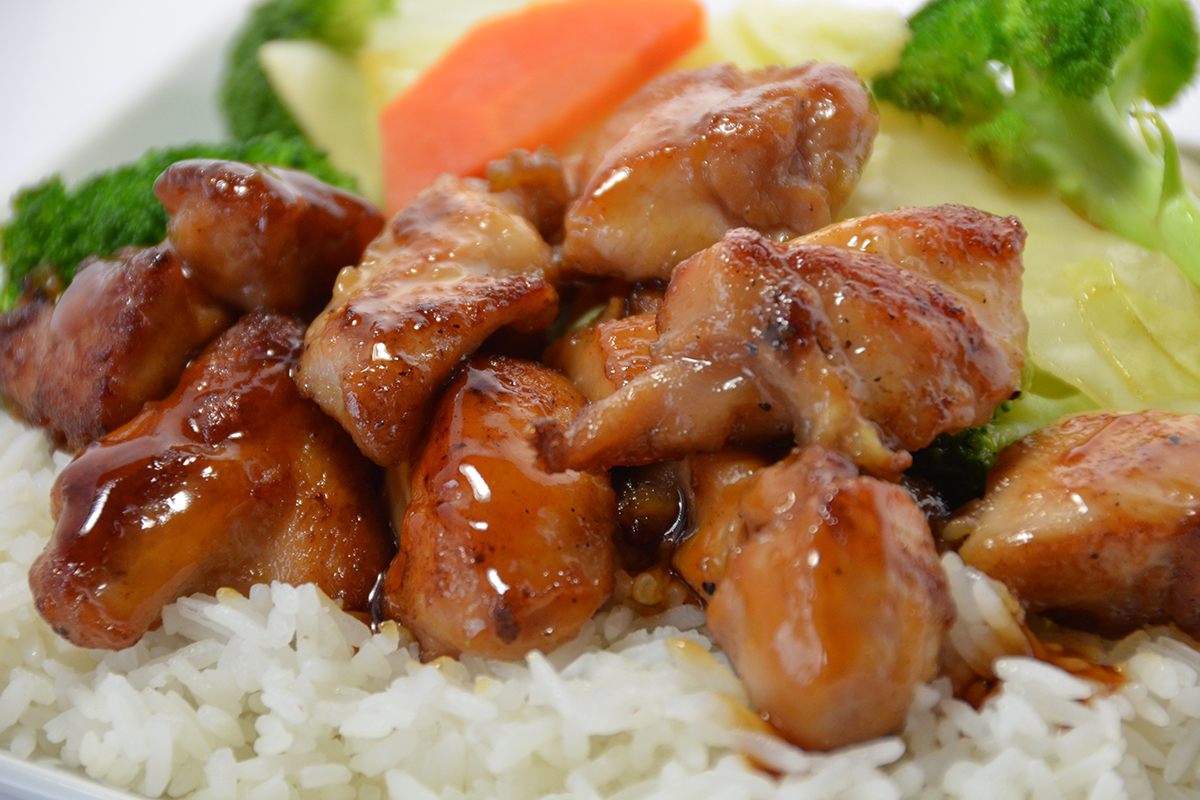 Grilled chicken teriyaki served over steamed white rice at Sakura Teriyaki, a Japanese Restaurant in NJ