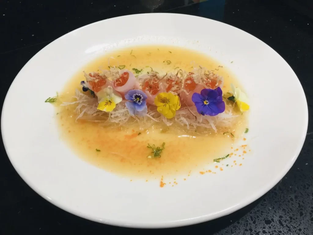 Delicate sashimi appetizer in light broth at Sakura，a Japanese Restaurant in Willis