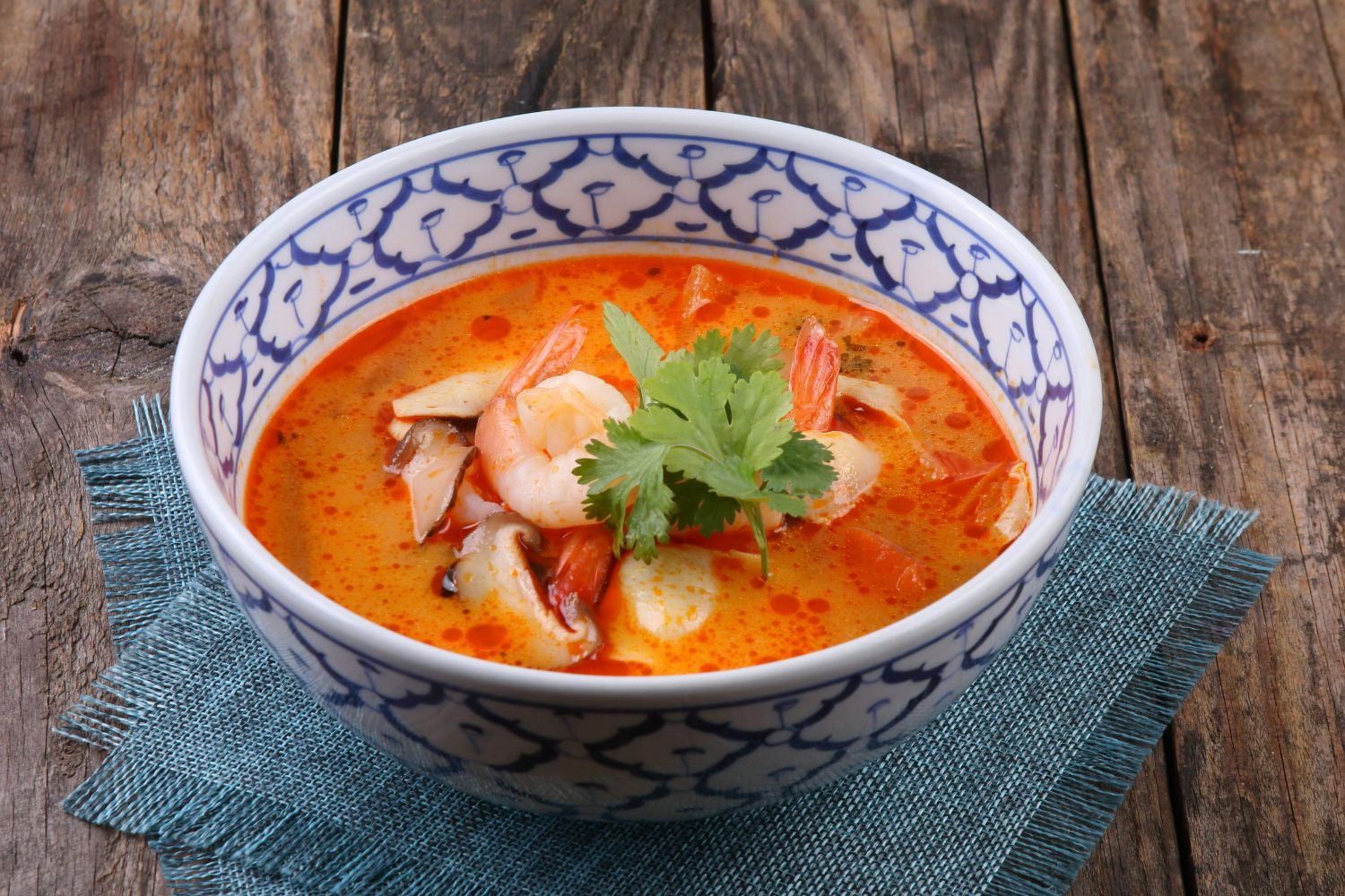 Thai tom yum shrimp soup in patterned bowl at Sam Bistro Thai Restaurant in Middletown