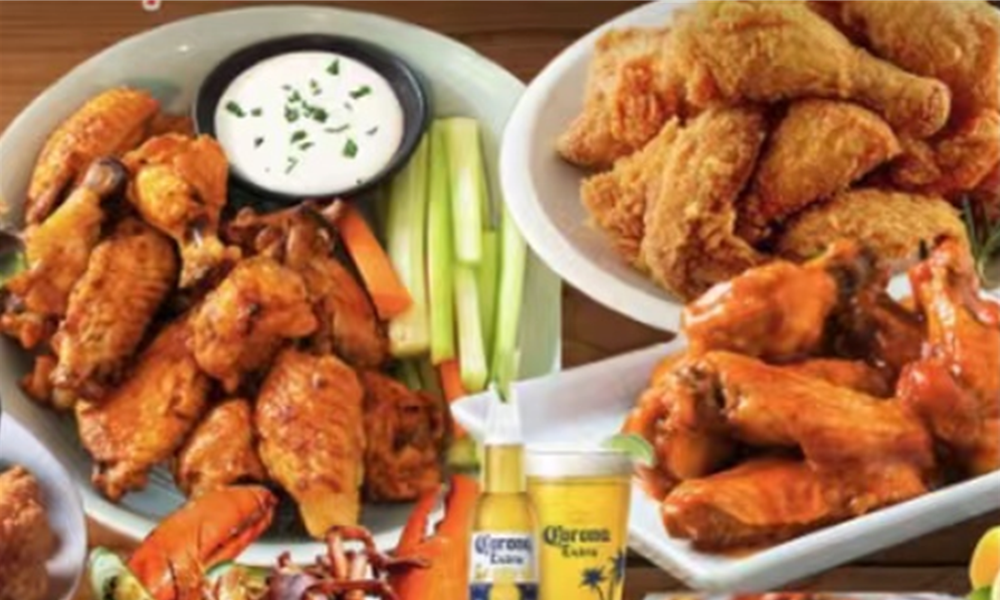 Assorted fried chicken wings with dip and veggies at Crab Seafood House-Sanford, a Seafood Restaurant in Sanford