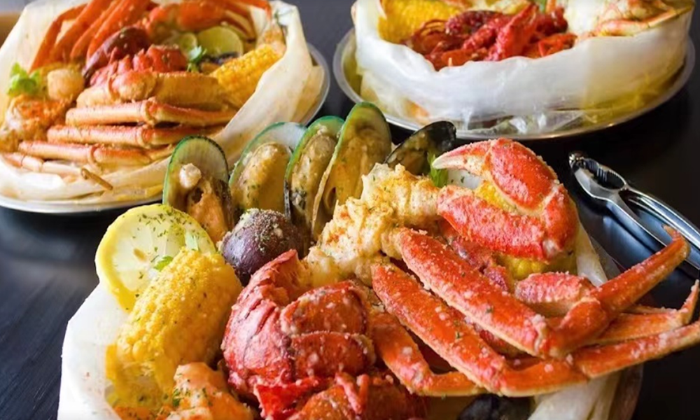 Crab, mussels, corn in a seafood boil platter at Crab Seafood House-Sanford, a Seafood Restaurant in Sanford