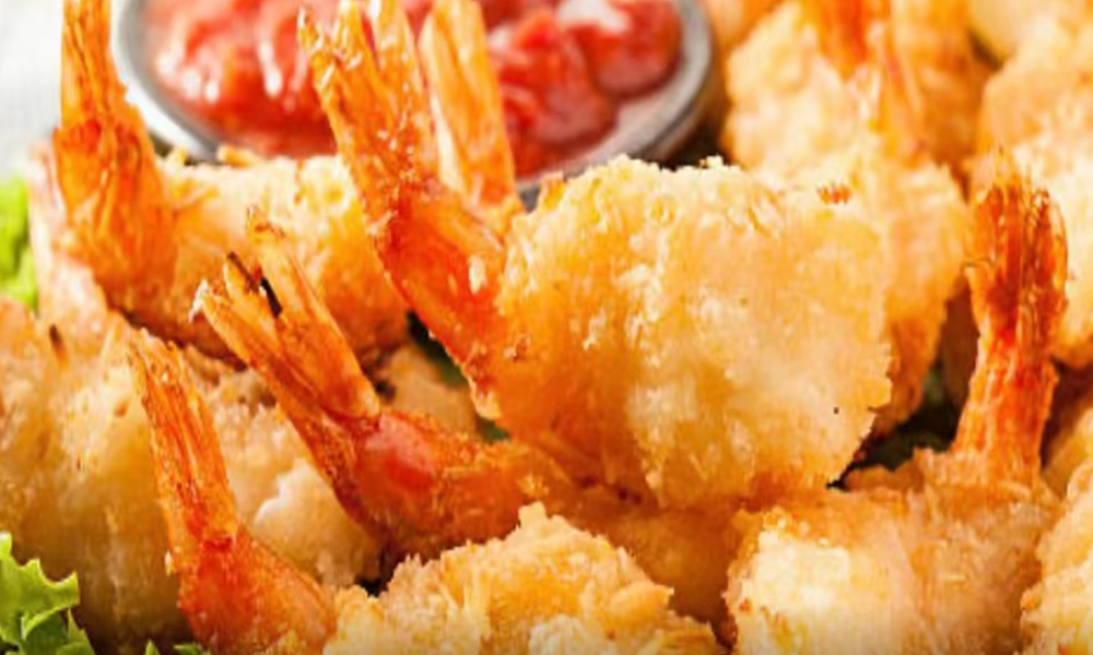 Baked oysters topped with garlic butter and herbs at Crab Seafood House-Sanford, a Seafood Restaurant in Sanford