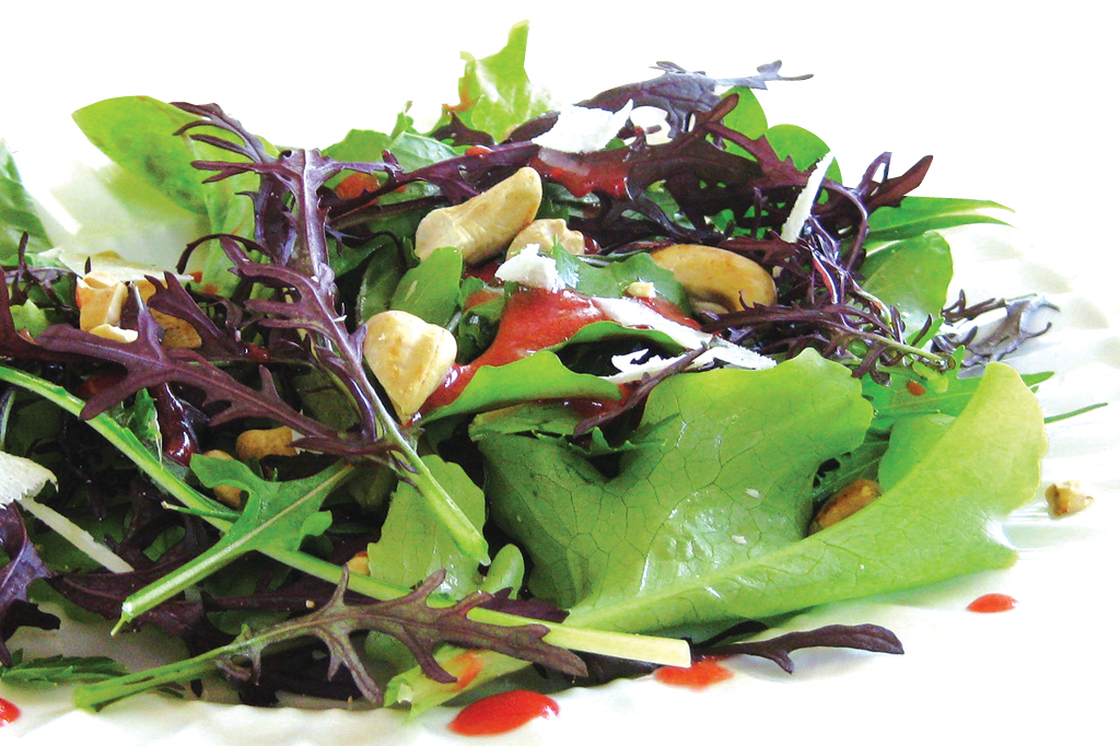 Mixed greens with nuts and dressing at Sasa, a Japanese Restaurant in Farmingdale.