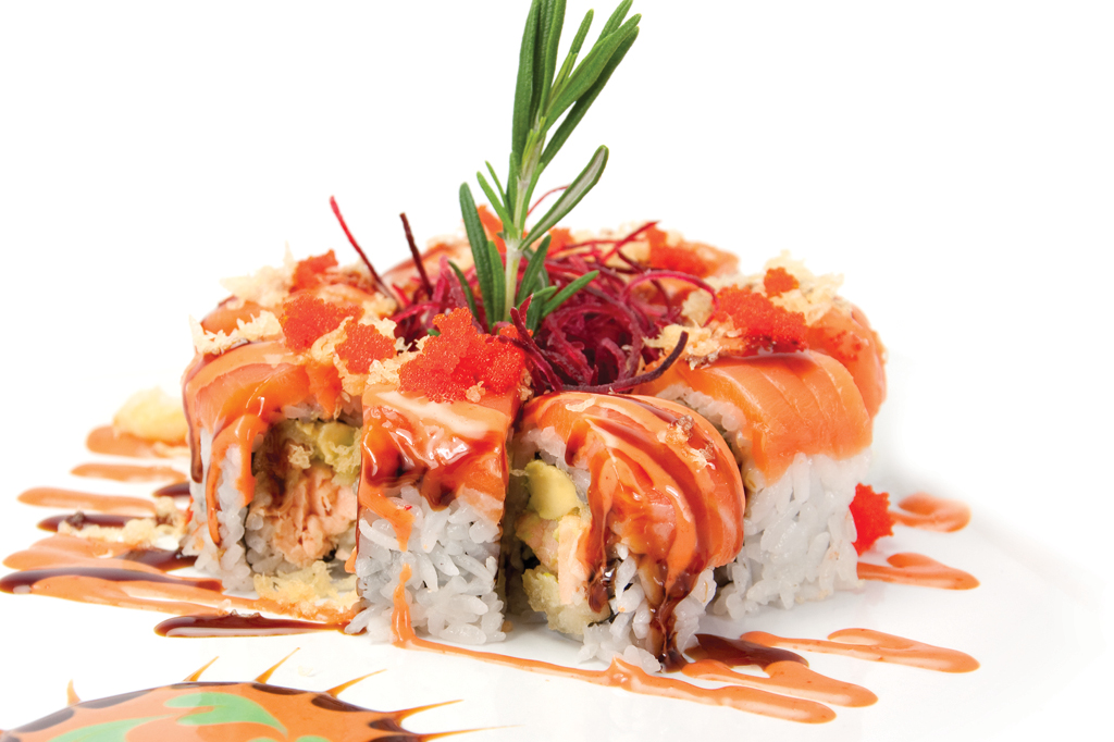 Creative sushi roll with vibrant toppings at Sasa, a Japanese Restaurant in Farmingdale.