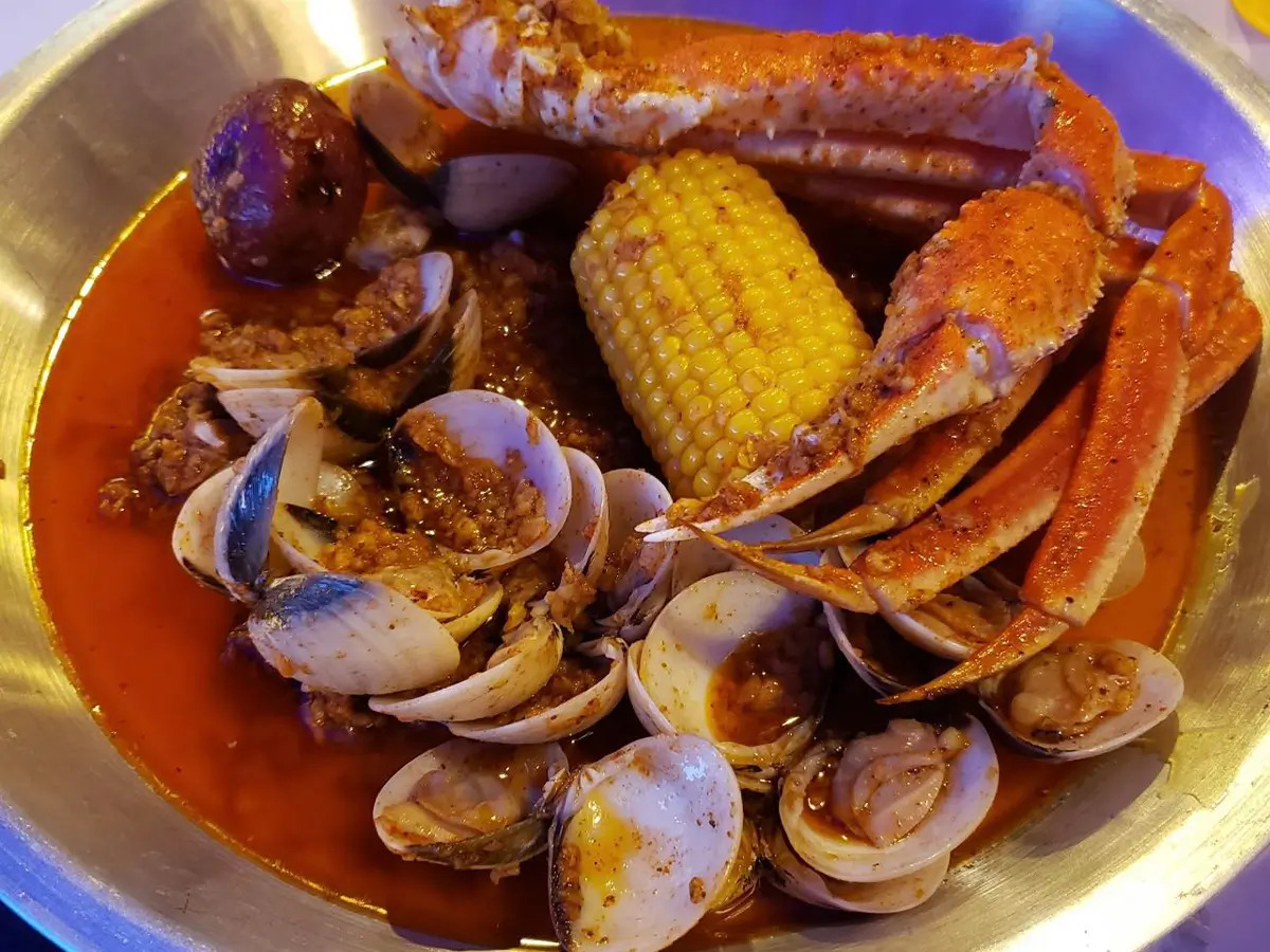 Rich crab and clam stew with corn in a savory broth at SAT Asian Seafood Restaurant & Bar in San Antonio