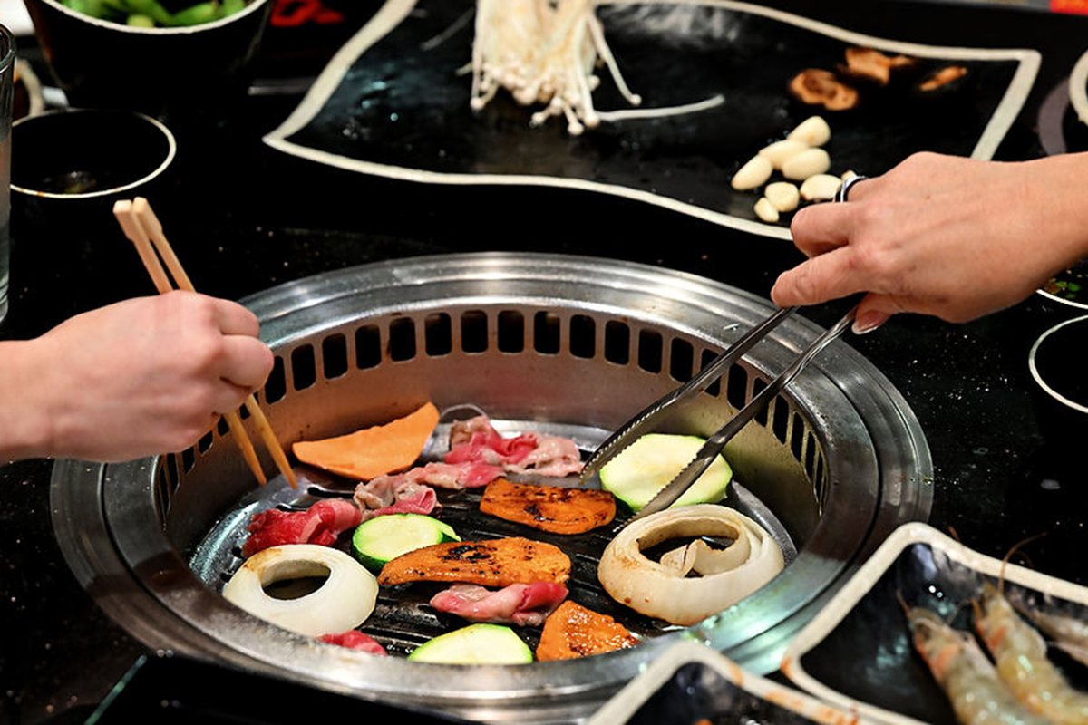 Grilling Vegetables and Meat at the Seoul Korean BBQ & Hotpot restaurant，a Korean Restaurant in Mason