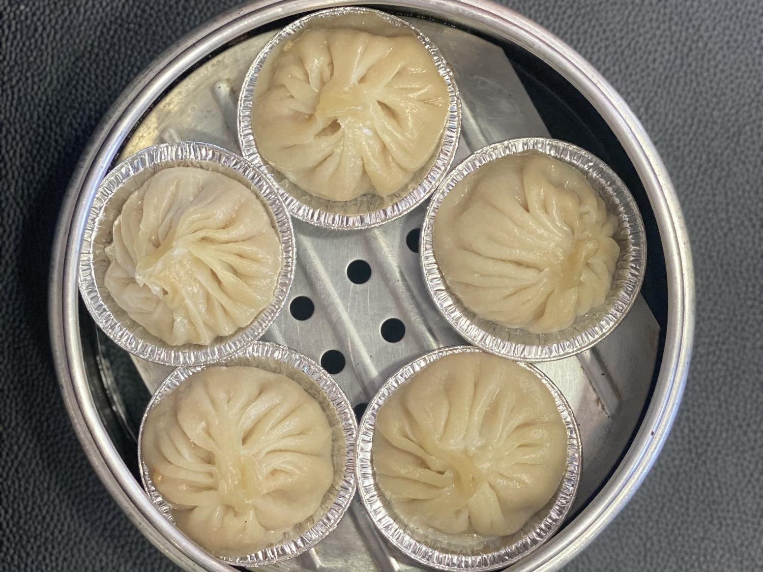 Steamed pork soup dumplings in foil cups at Sheng Hui Dim Sum, a Chinese Dim sum restaurant in West Covina