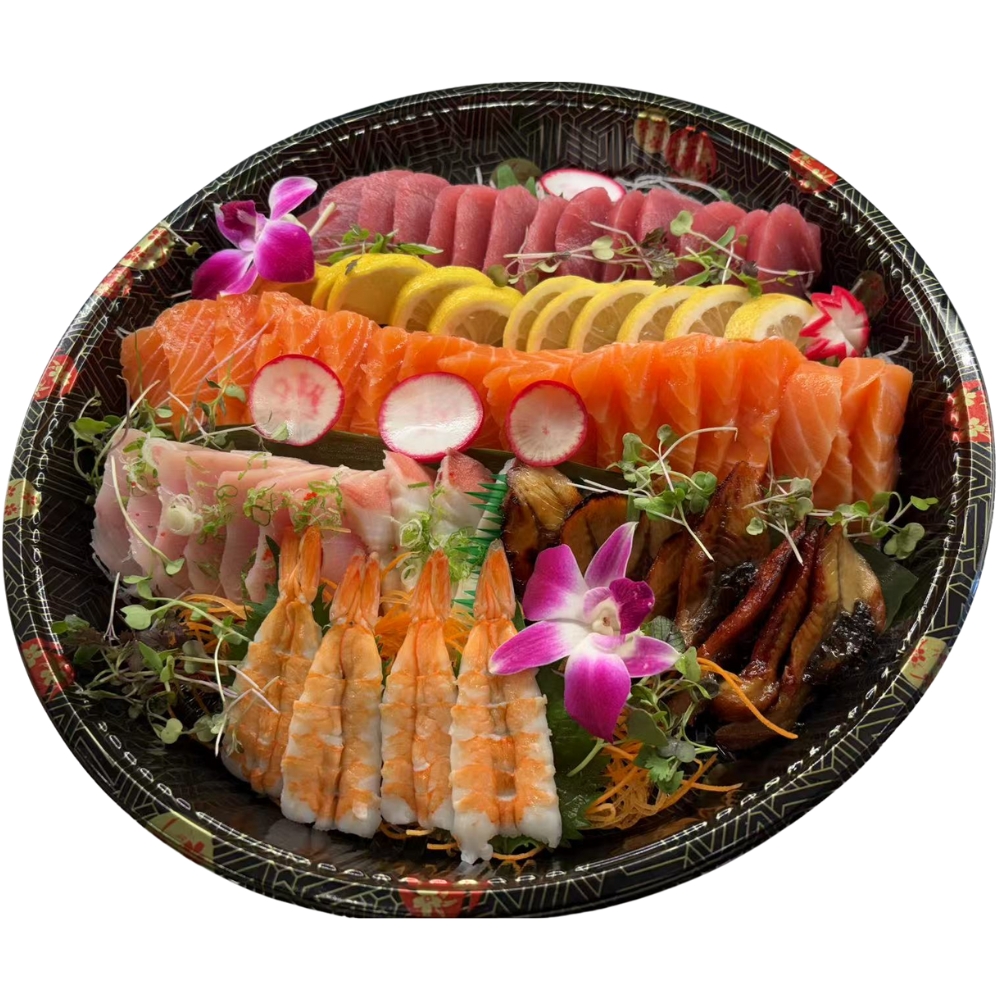 Sashimi platter with tuna, salmon, shrimp and garnishes.