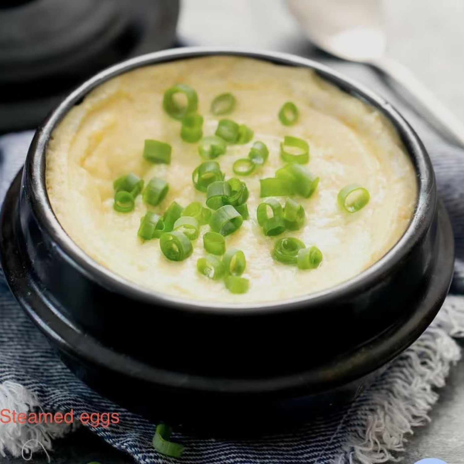 Silky steamed eggs with scallions at Shila Korean BBQ And Hot Pot, a Asian Fusion Restaurant in Oklahoma City