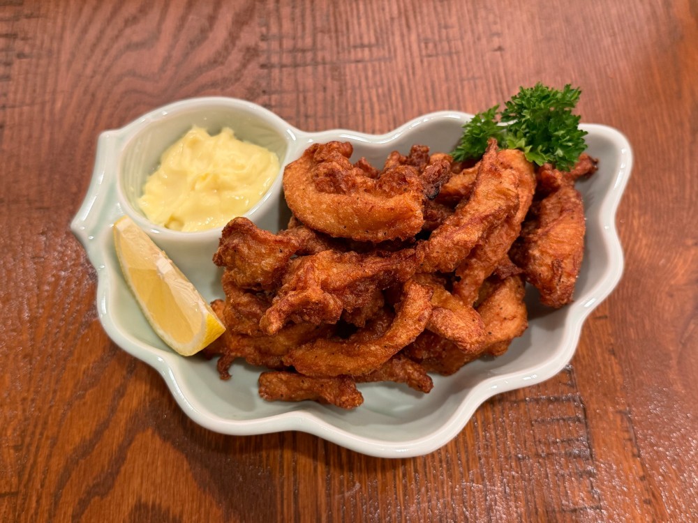 Crispy fried calamari with tartar sauce and lemon at Shogun, a Japanese Restaurant in Rutherford.