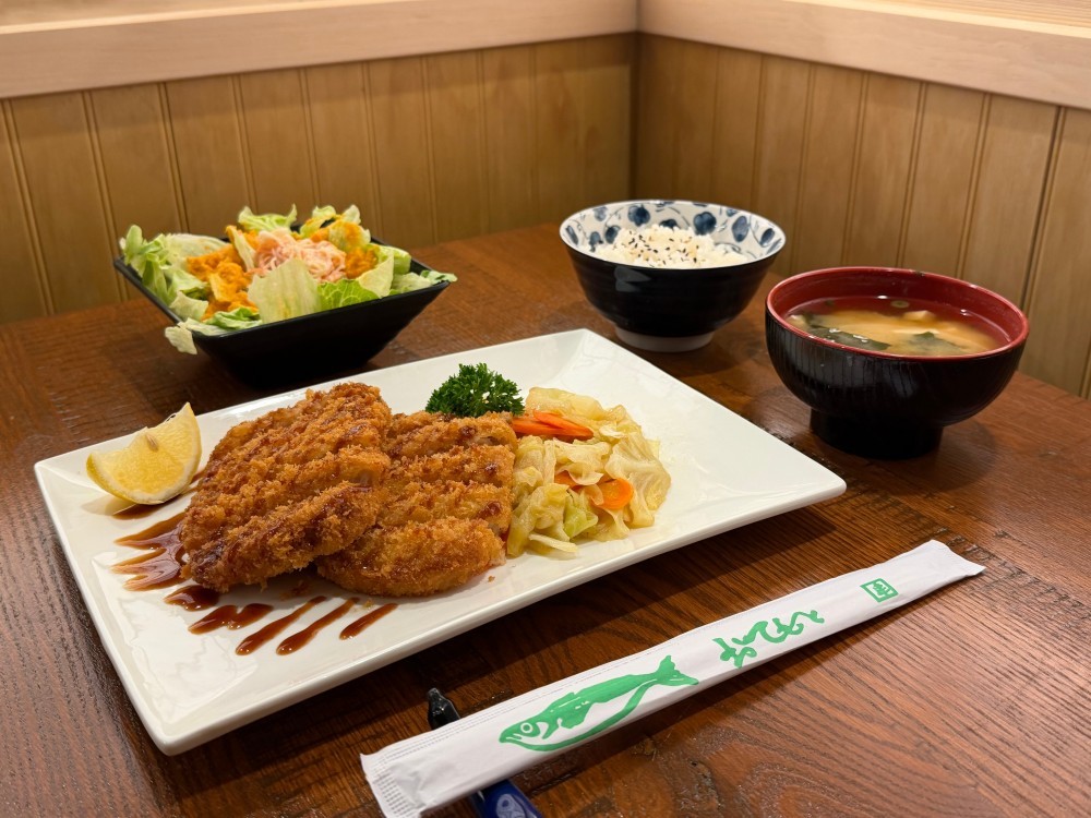 Crispy chicken katsu with rice, miso soup, and salad at Shogun, a Japanese Restaurant in Rutherford.