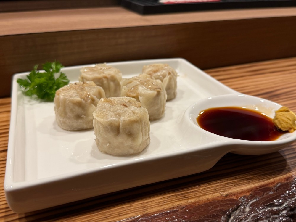 Steamed pork shumai served with soy sauce at Shogun, a Japanese Restaurant in Rutherford.