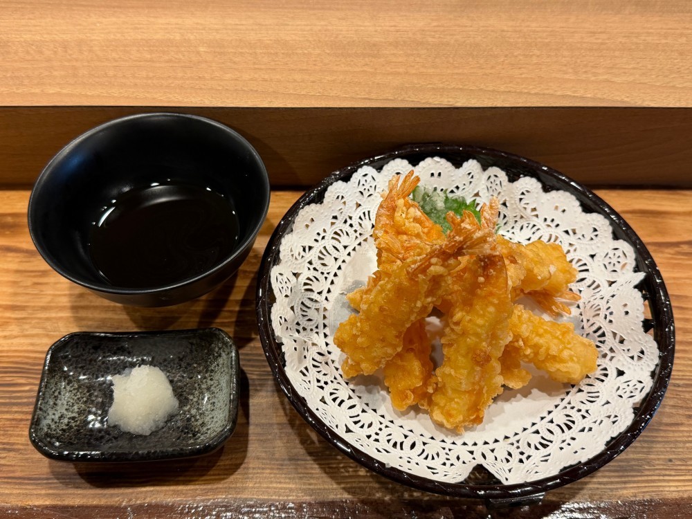 Crispy shrimp tempura with dipping sauce and daikon at Shogun, a Japanese Restaurant in Rutherford.
