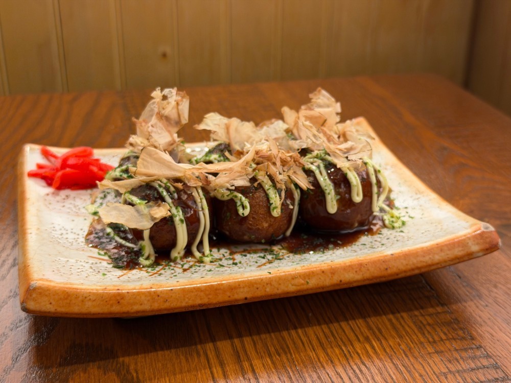 Crispy takoyaki with bonito flakes and special sauce at Shogun, a Japanese Restaurant in Rutherford.