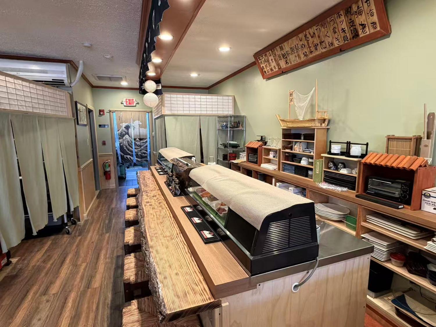 Authentic sushi bar with counter seating and traditional decor at Shogun, a Japanese Restaurant in Rutherford