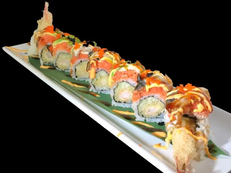 Shrimp tempura maki coated with tobiko and mixed sauces at Shoku Sushi & Bar, a Japanese Restaurant in Monroe