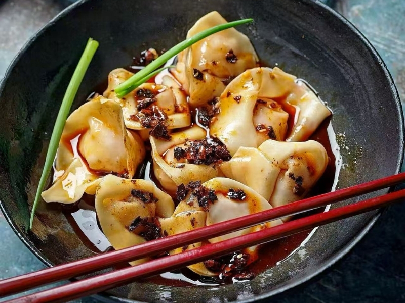 Wontons in spicy chili oil at Silver Spring Sichuan Bistro, a Chinese Restaurant in Silver Spring