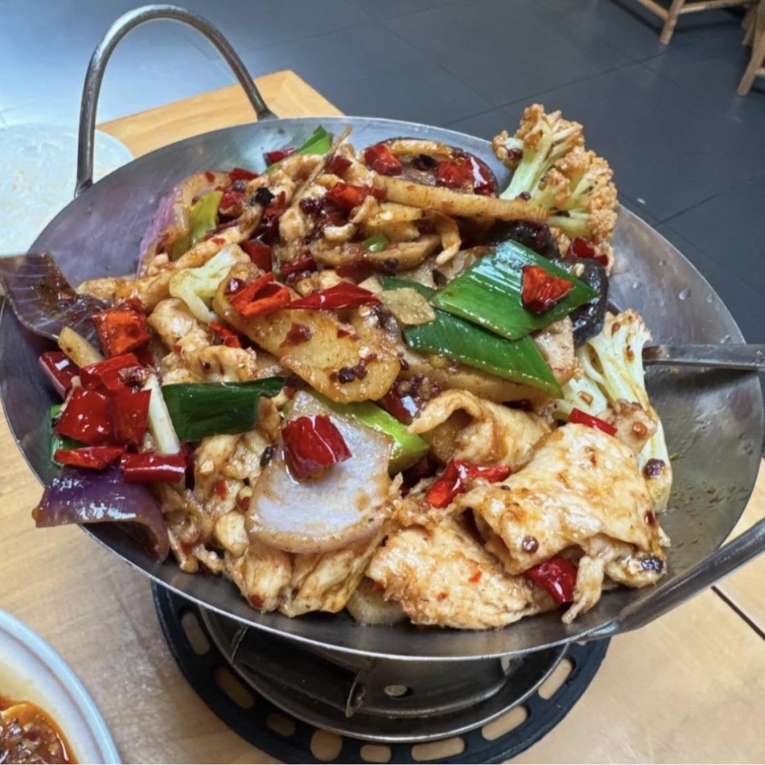 Spicy dry pot chicken with various vegetables, full of Sichuan flavors at Silver Spring Sichuan Bistro, a Chinese Restaurant in Silver Spring