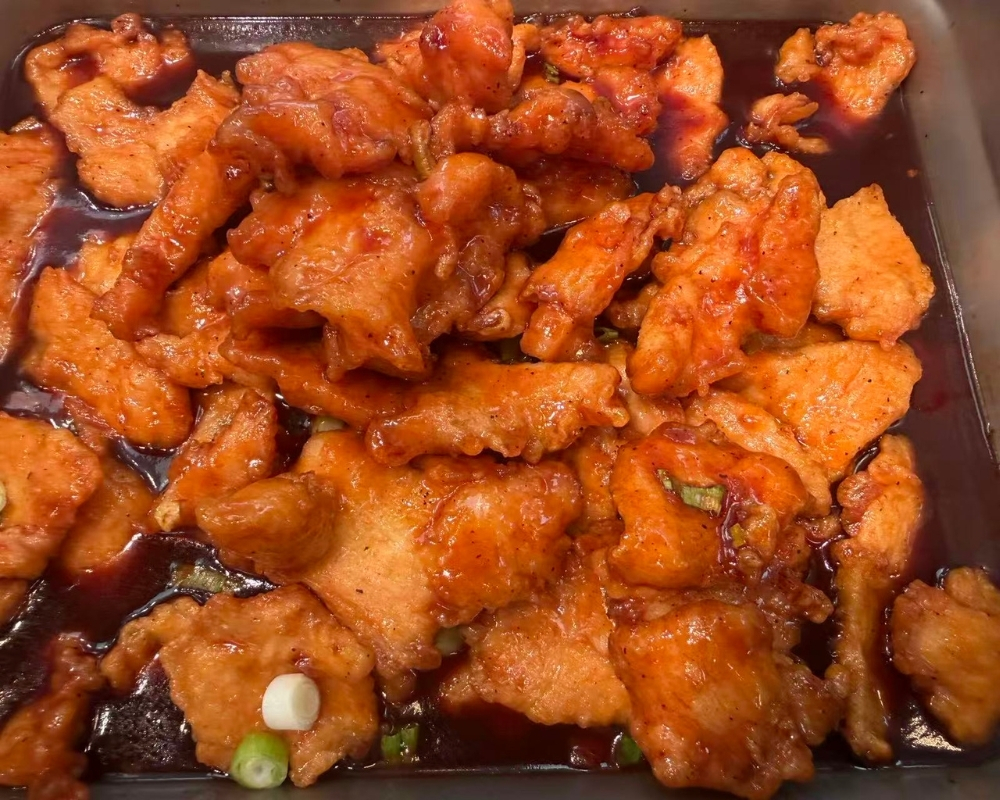 Sweet sour fried pork slices with scallions at Siu Lap City, a Chinese Restaurant in Houston