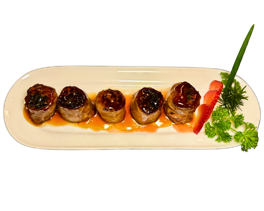Ribeye and scallion rolls with teriyaki sauce at SOHO Asian Fusion, a Asian Fusion Restaurant in Austin.
