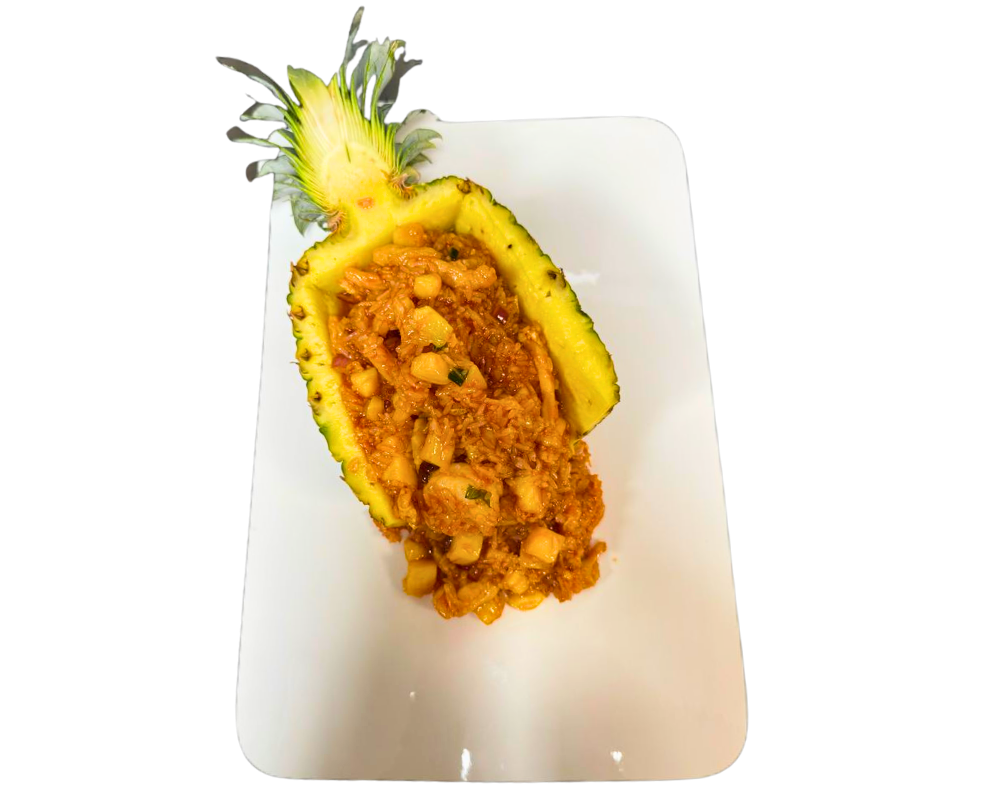 Fried rice with shrimp & chicken served in a pineapple at SOHO Asian Fusion, a Asian Fusion Restaurant in Austin.
