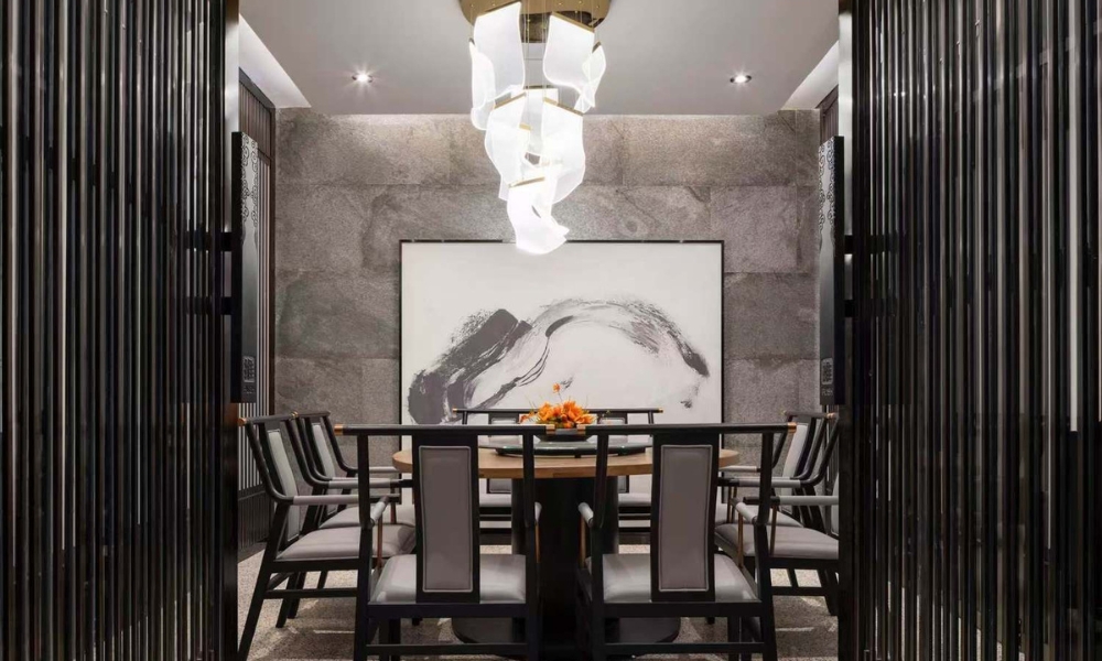 Private dining room with stone walls, artistic chandelier, and ink painting at Spicy Home 那家川菜，a Chinese Restaurant in Hacienda Heights