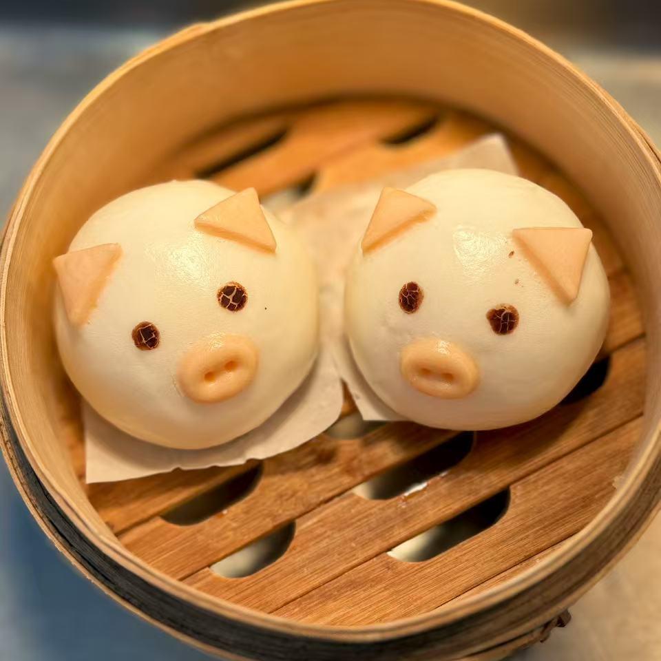 Piggy Custard Bun - Cute pig - shaped buns with creamy custard filling at Starbelly Asian Kitchen, a Asian Fusion Restaurant in Montclair