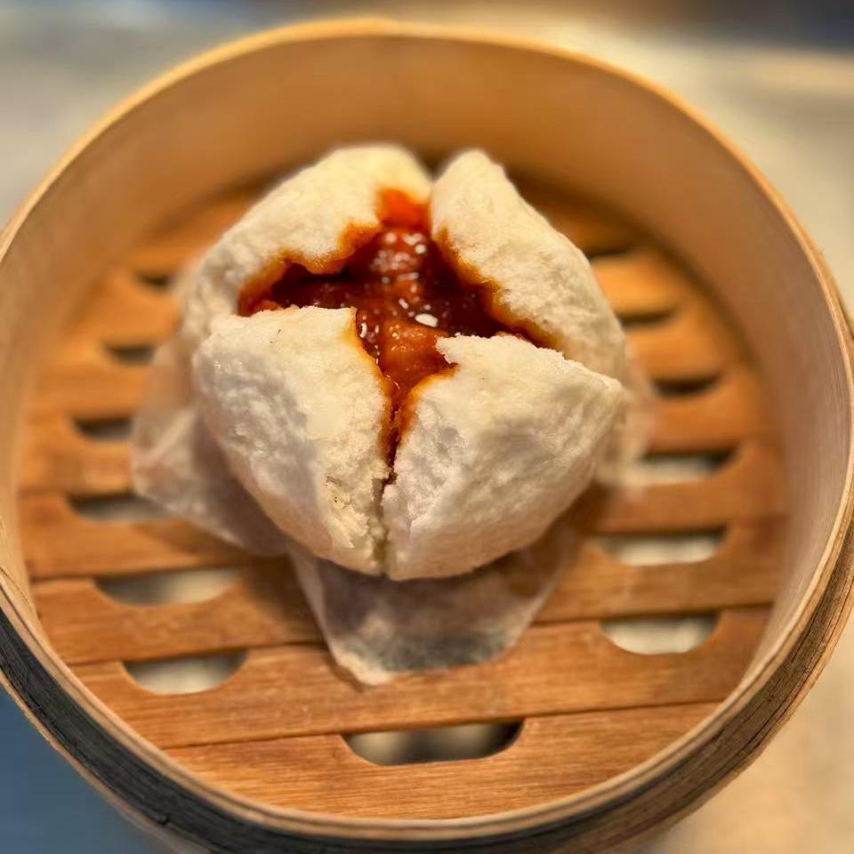 Pork Bun - Steamed bun with savory pork filling, open - faced style at Starbelly Asian Kitchen, a Asian Fusion Restaurant in Montclair