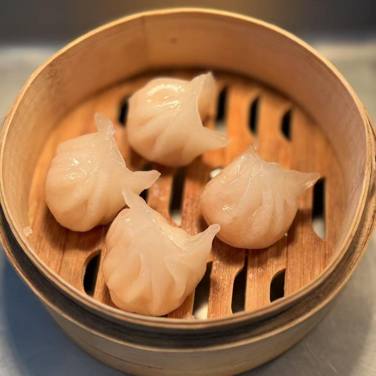 Shrimp Dumplings - Translucent - skinned dumplings filled with fresh shrimp, steamed in bamboo at Starbelly Asian Kitchen, a Asian Fusion Restaurant in Montclair