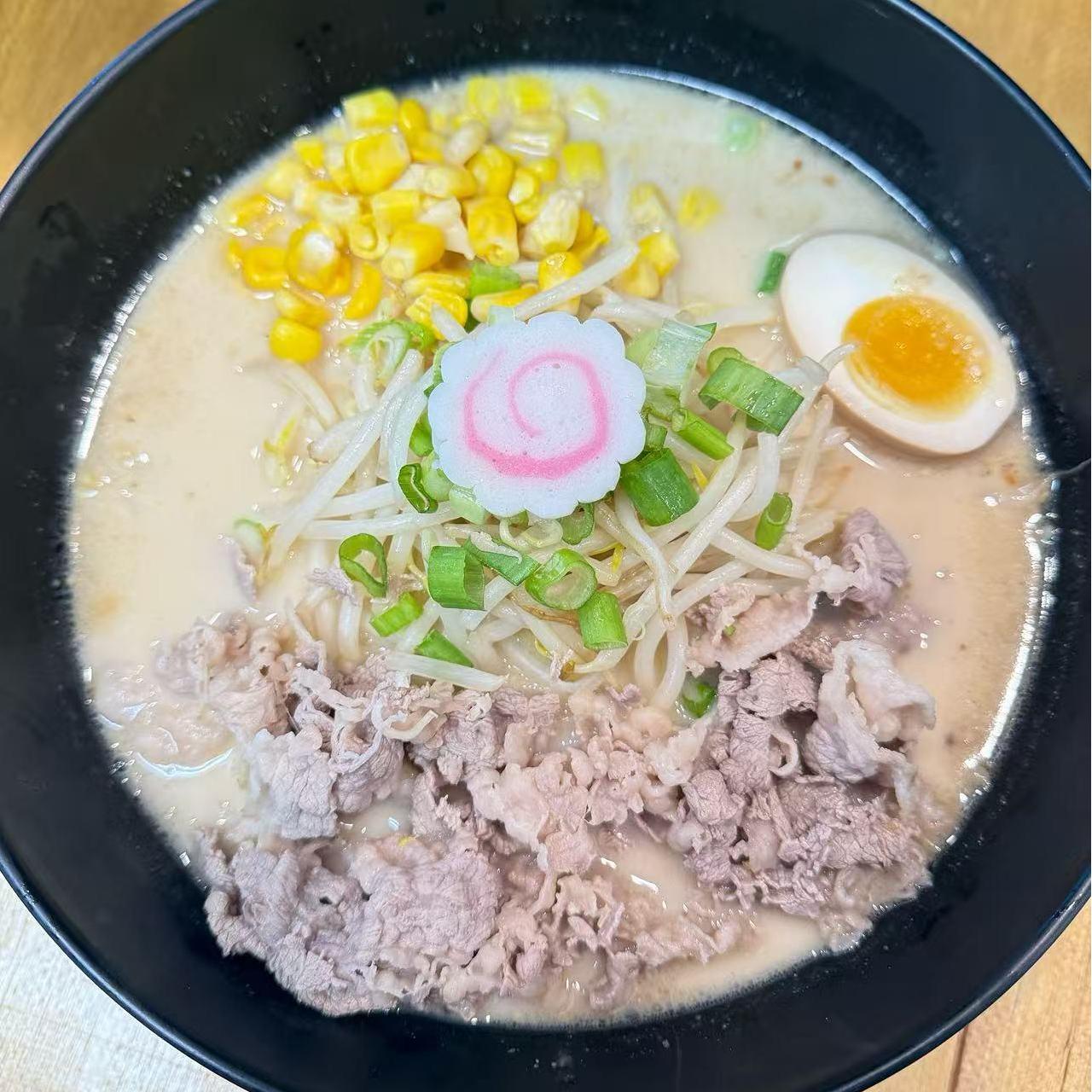 Beef ramen with corn, bean sprouts, soft - boiled egg and scallions at Starbelly Asian Kitchen, a Asian Fusion Restaurant in Montclair