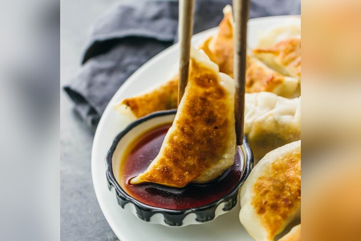 Stix-By-AZN-Asian-Restaurant-Chicken-Dumpling-Peachtree-City Crispy chicken dumpling with dipping sauce at Stix By AZN, a Asian Restaurant in Peachtree City.