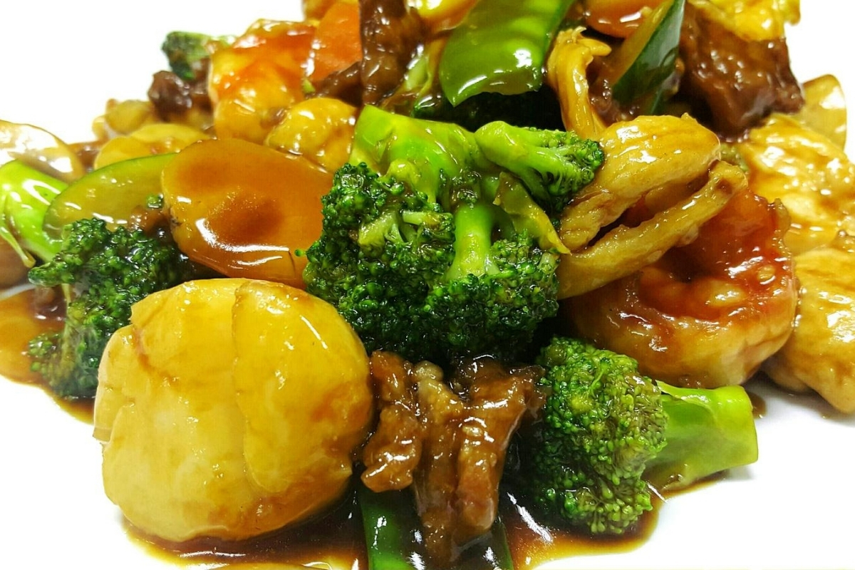 Stix-By-AZN-Asian-Restaurant-Happy-Family-Peachtree-City Mixed seafood and veggies in savory sauce at Stix By AZN, a Asian Restaurant in Peachtree City.