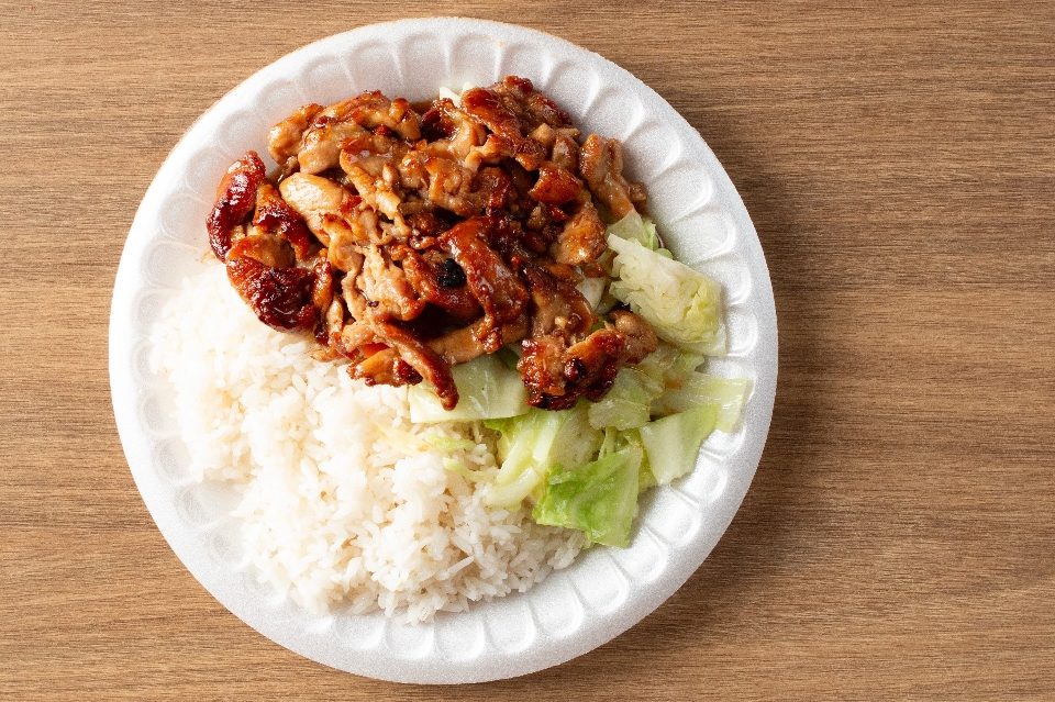 Glazed chicken teriyaki served with rice and cabbage at Suki Hana, a Japanese Restaurant in Valencia